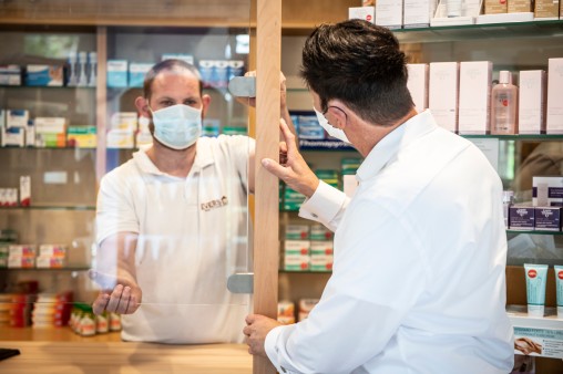 Installation of spit protection in a pharmacy