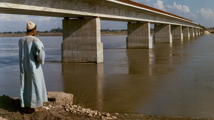 Man in front of a bridge in Egypt