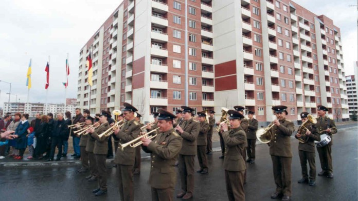 Russian troops march in the city of Novograd