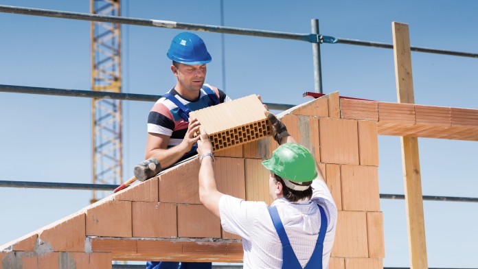 Bricklayer on building a house