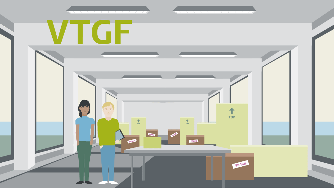 Illustration for VTGF: two people are standing in an office, removal boxes in the background