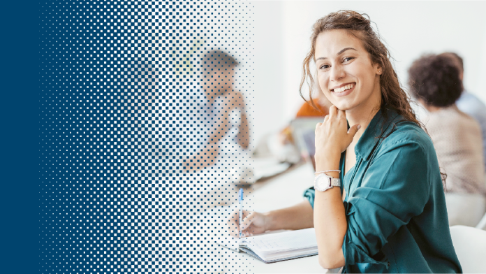 Woman at a laptop in a meeting room