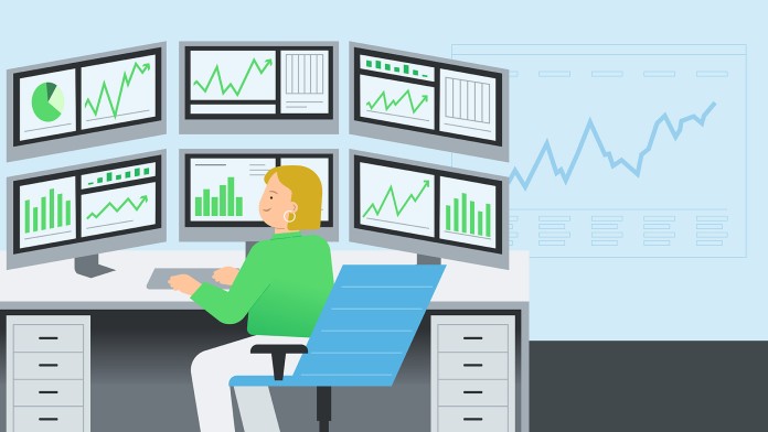One person sits in front of six computer monitors displaying current financial charts