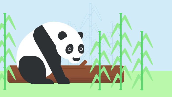 A panda bear sits on a tree trunk in nature, with bamboo next to it