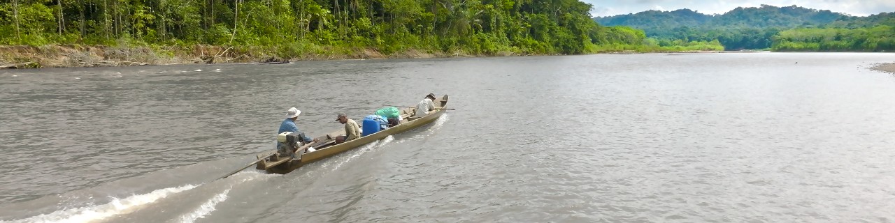 Small motorboat with people on the Amazon river