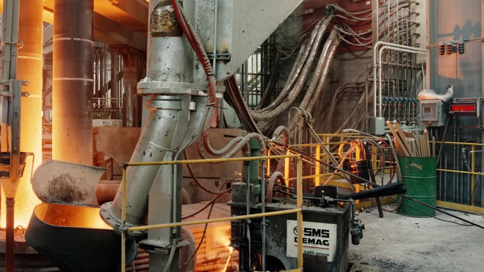 Machine in a steel factory in which red-hot metal is processed