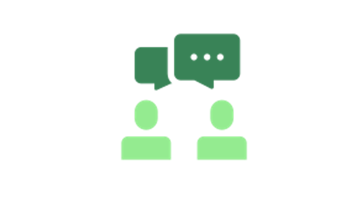 Icon mit zwei Personen, die ein Dialog führen in grün