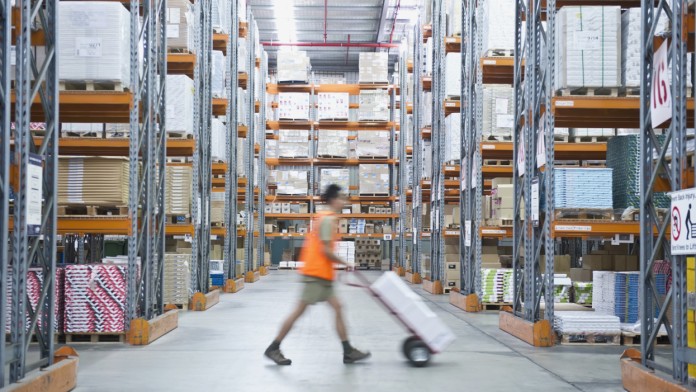 Worker in storage room