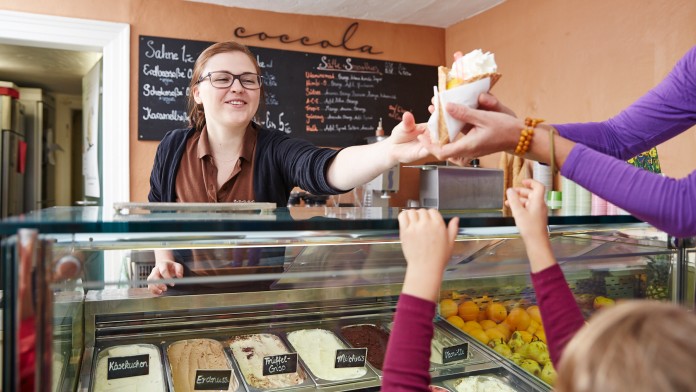 Lady serving ice cream