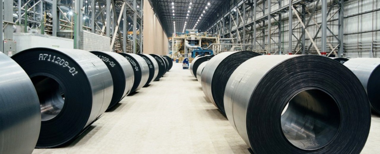 Warehouse with large sheet metal rolls as raw material