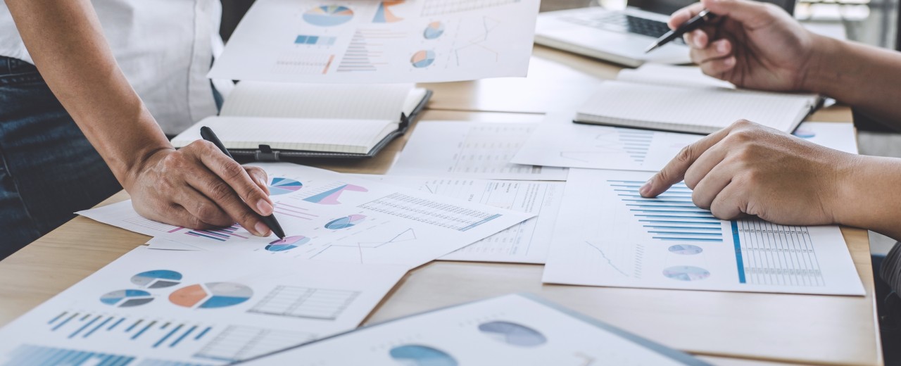 Business team meeting working with new startup project, discussion and analysis data the charts and graphs