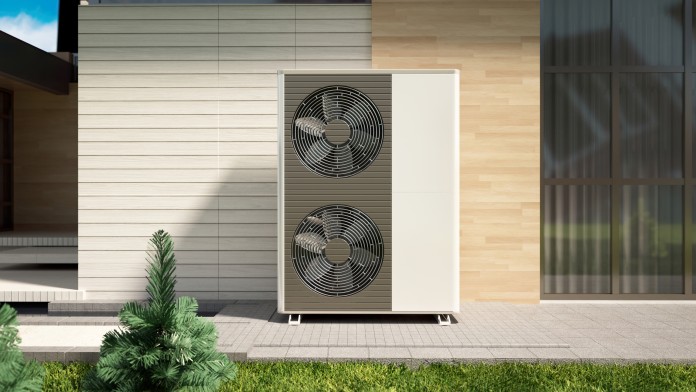 Heat pump in front of a house