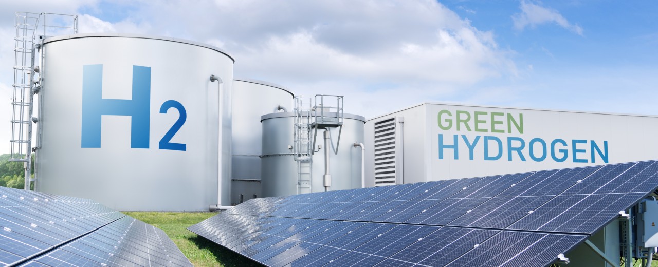 hydrogen tanks with a photovoltaic plant in front