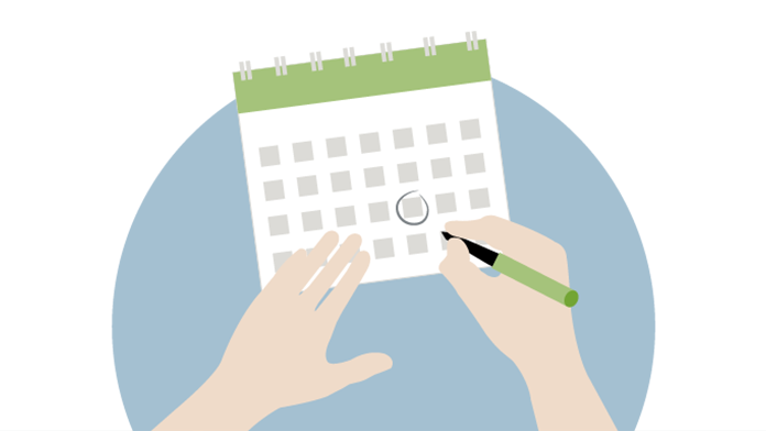 Eine Hand kreist mit einem Stift auf einem Kalender ein Datumsfeld ein, die andere Hand liegt auf dem Kalender.
