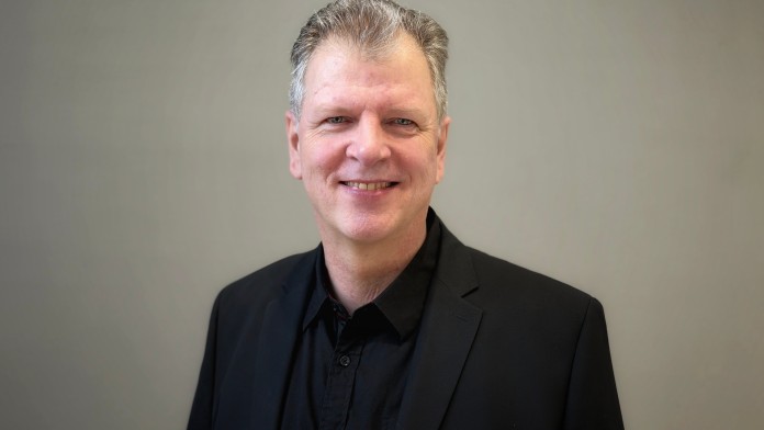 Das Portrait zeigt Lars Müller.