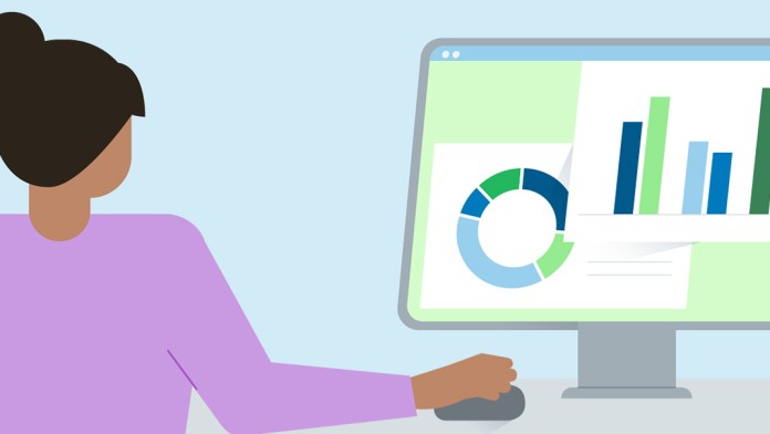 The image shows a person sitting in front of a screen.