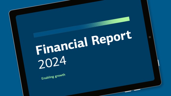 The cover image of the KFW financial report is displayed on a tablet.