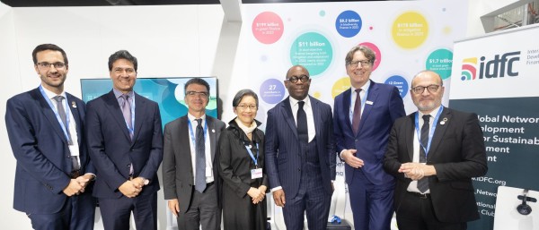 The CEO of KfW speaks during a panel discussion at COP 29