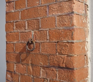 Iron ring on a brick pillar