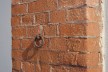 Iron ring on a brick pillar