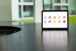 A tablet screen displays various work options