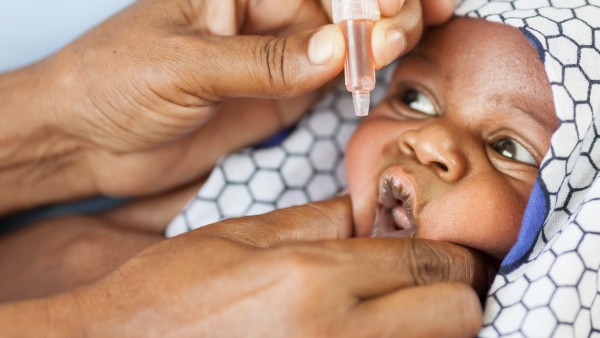 Baby receives polio vaccination