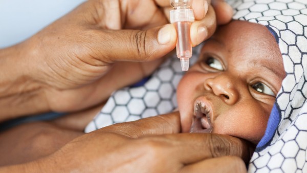 Baby receives polio vaccination