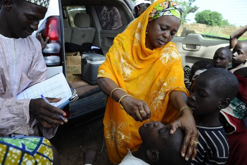 A child in Nigeria receives Polio vaccination