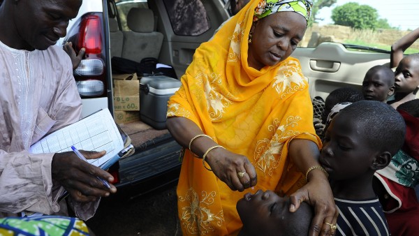 A child in Nigeria receives Polio vaccination
