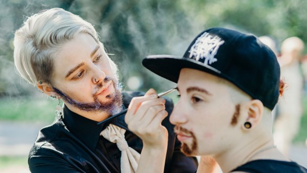 Jacqueline Grundner using make-up to transform a woman into a man