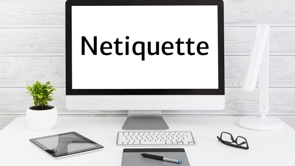 Table with screen saying netiquette