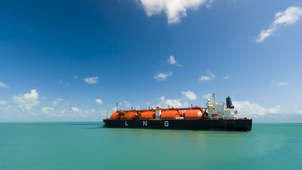 A large Liquid Natural Gas tanker is sailing on the sea.