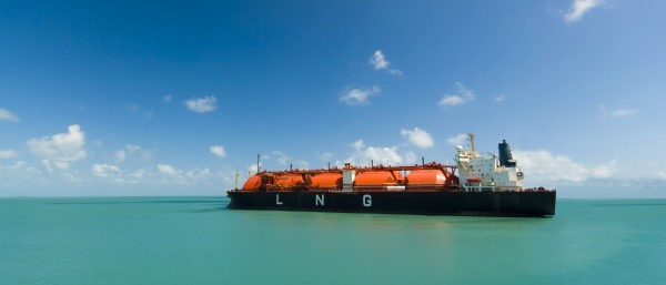A large Liquid Natural Gas tanker is sailing on the sea.