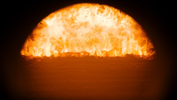 View into the furnace fire of a combined heat and power plant