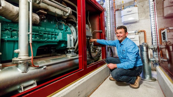 Thomas Gessler in the engine room of the local heat network