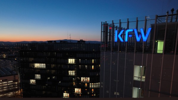 KfW logo on the main house after dark