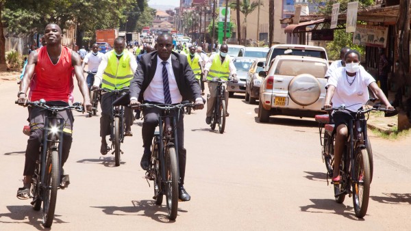 A group of e-cyclists in a street