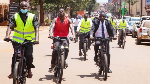 A group of e-cyclists in a street