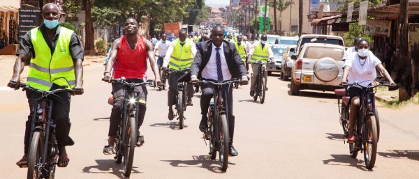 A group of e-cyclists in a street