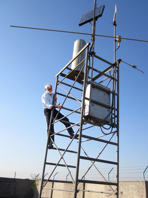 Parvaiz Naim inspects a glacial monitoring telemetric equipment tower