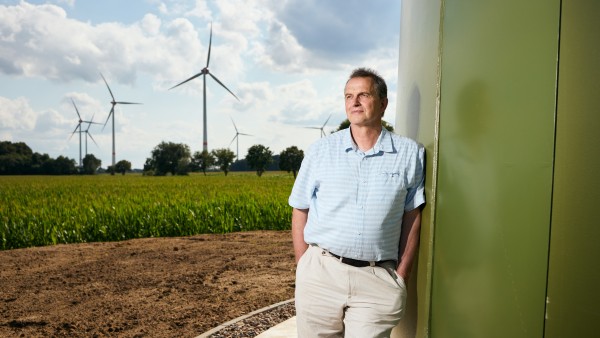 mayor Weber in front of wind turbine