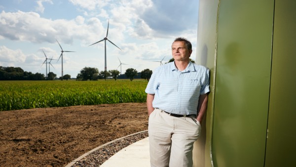 mayor Weber in front of wind turbine