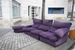 Purple sofa standing in the street