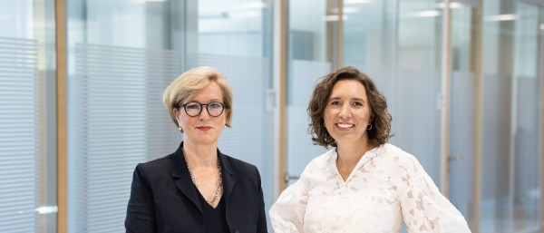 Two female Employees in office of Bank Group KfW, on the right is Mrs. Katrin Reich from GSO and on the Left is Mrs. Bettina Dorendorf from SIS2.