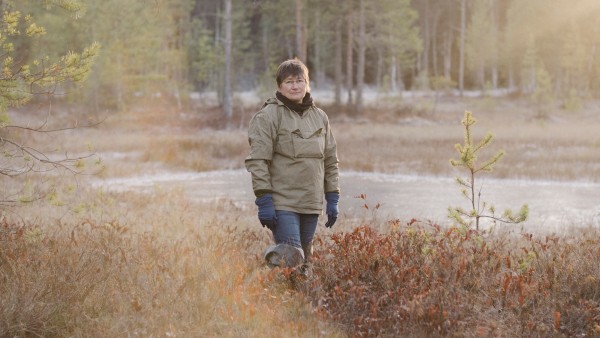 Biologist Tatiana Minayeva at her workplace, the peatland