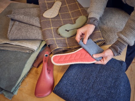 A variety of fabrics laid out for a new Wildling shoe model