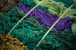 Old, used fishing nets in different colors