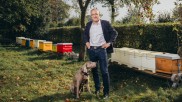 Dieter Schimanski with dog and bees