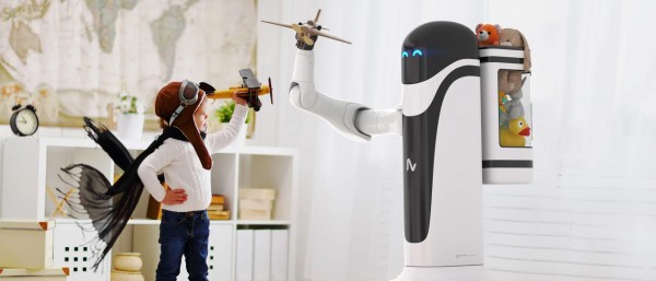 A Child standing in front of a roboter of Neura