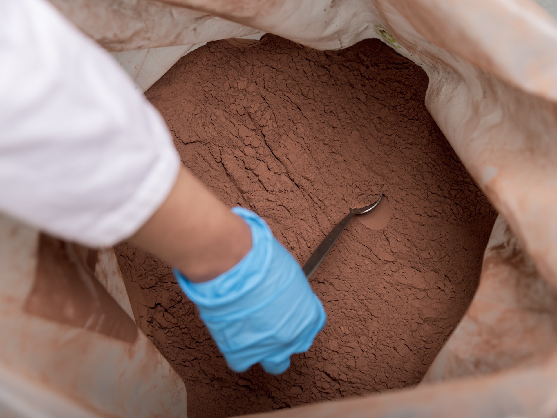 Bag filled with brown poweder